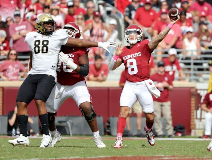 Oklahoma's Dillon Gabriel (8) throws a pass in the second half of the college football game between the University of Oklahoma Sooners and the University of Central Florida Knights at Gaylord Family Oklahoma-Memorial Stadium in Norman, Okla., Saturday, Oct., 21, 2023.